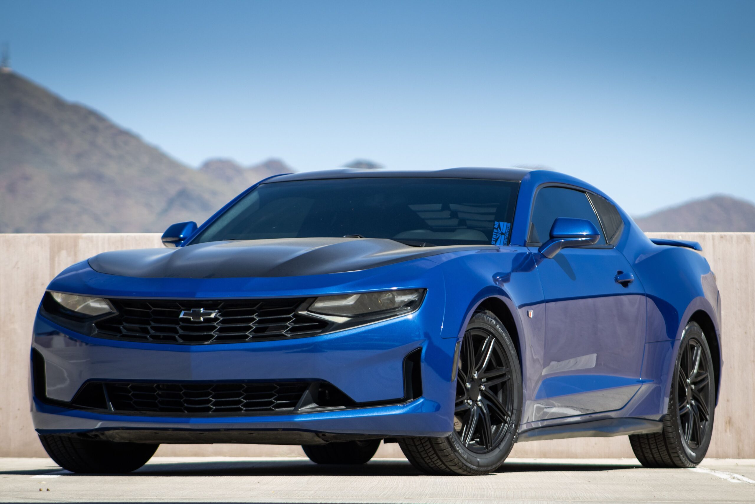 Performance car in an Arizona mountain setting representing custom vehicle garage storage