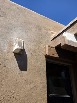 Exterior beam ends after repair preparation on Arizona home